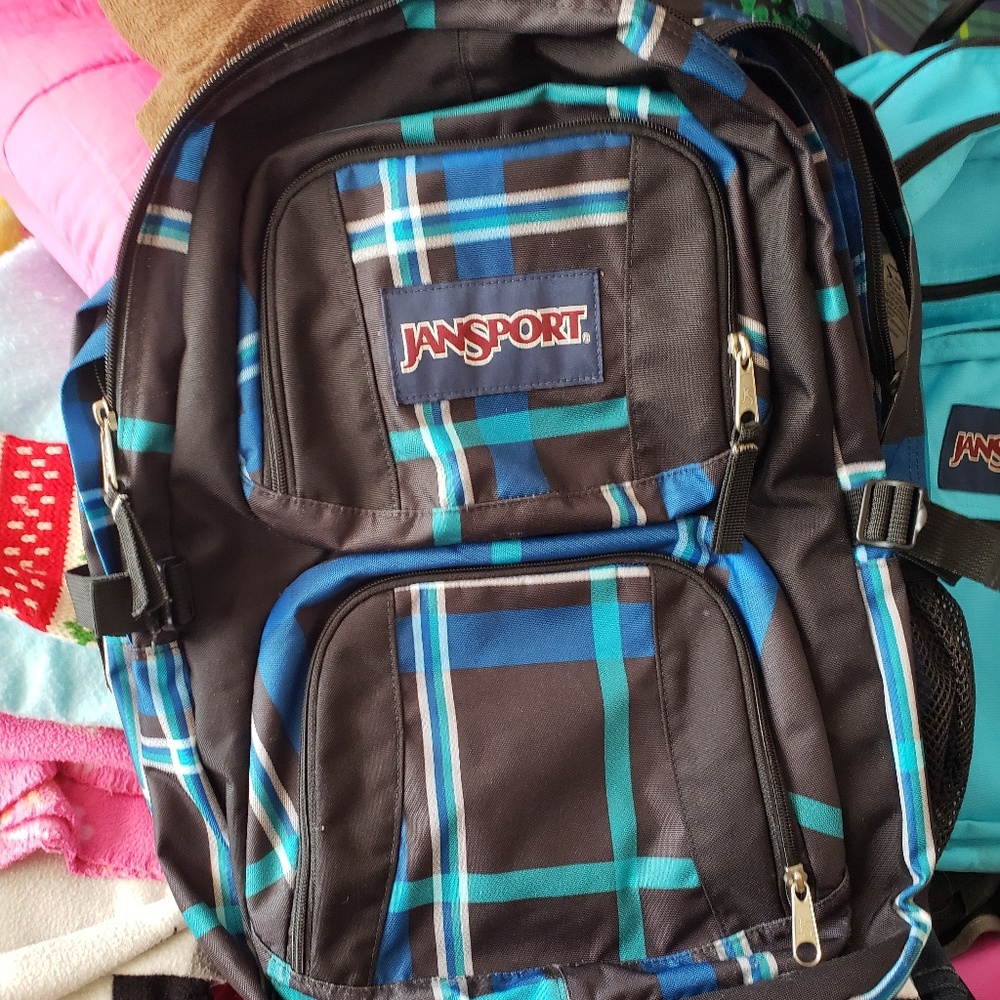 JanSport plaid canvas computer pocket backpack